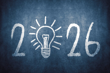 2026 Creative Ideas and Innovation Concept with Chalk Light Bulb on Blue Grunge Background