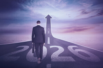 Businessman Walking Toward Future Success on Road to 2026