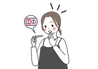 妊娠検査薬で妊娠が判明して喜んでいる女性
