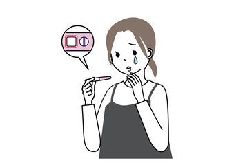 妊娠検査薬が陰性で泣いている女性