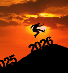 Man Leaping from 2025 to 2026 at Sunset: New Year Transition