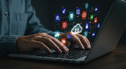 Person using laptop with digital cloud network and technology icons overlay