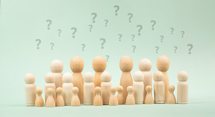 Crowd of people with question marks, searching for answers, brainstorming for solution, fear of...