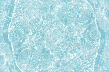 Blue water with ripples on the surface. Defocus blurred transparent blue colored clear calm water...