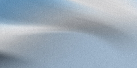 A grainy abstract background featuring blurred motion with blue, white, and gray gradients creating a textured and smooth effect