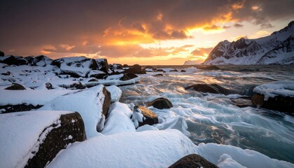 Golden Sunset Glow Illuminating Snowy Landscape Over Ice Covered Rocks in Coastal Region