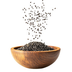 Chia seeds falling into wooden bowl superfood healthy eating antioxidant rich diet food