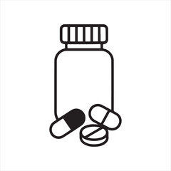 medicine bottle and pills