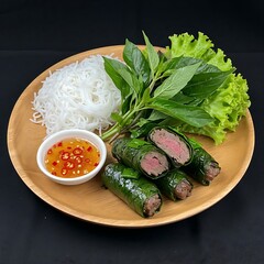 A plate of Bo La Lot (Beef Wrapped in Betel Leaves) with grilled beef wrapped in betel leaves, served with dipping sauce.      , is arranged on teak wood platter, 
