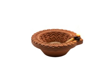 Traditional Clay Diya Lamp Glowing Light for Diwali Celebration PNG