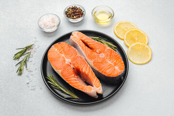 Fresh salmon fillets prepared for a healthy meal with lemon and herbs