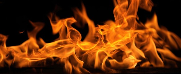 The mesmerizing dance of flames illuminating a dark background.