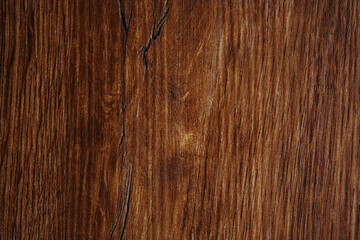 Dark brown wood texture background with straight grain lines and natural finish