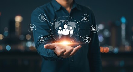 Man holding a glowing digital network of global business connections and icons representing strategy and growth