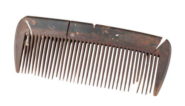 wooden comb closeup old and broken isolated on transparent background