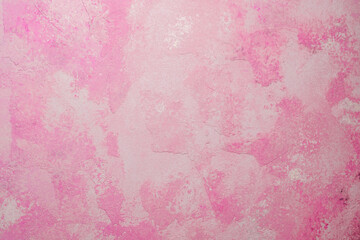 Pink abstract textured plaster wall background