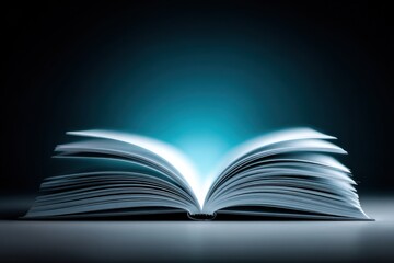 Captivating open book with illuminated pages against dark background in a quiet setting
