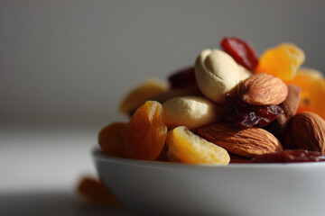 minimalist christmas celebration atmosphere in usa featuring bowl filled with assorted nuts and colorful candied