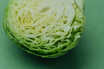 Fototapeta premium Closeup of halved cabbage showing detailed leaf structure