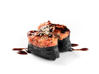 Two pieces of sushi, beautifully presented with sauce and sesame seeds on a white backdrop.