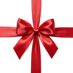 A close up of a tied red ribbon with a bow in the center on a black isolated background image shot