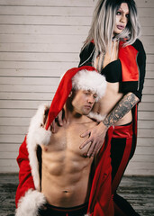 Modern relationships. Drag queen and  boyfriend celebrate Christmas together.