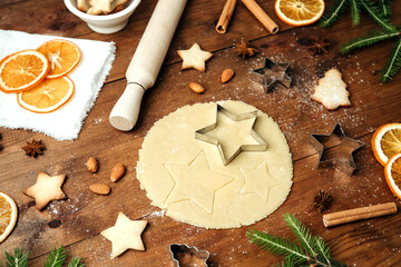 Christmas cookie dough with cutters and star shapes for festive baking and holiday food concept