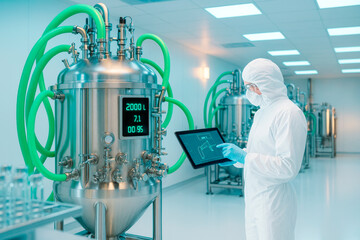 Scientist in sterile suit monitoring smart bioreactor system using tablet in high-tech laboratory with bright lighting and futuristic concept background. Ai generative
