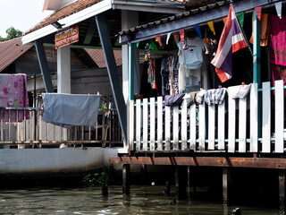 Canal-Side Living with Drying Laundry in Bangkok