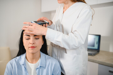 Microscopic examination of the hair and skin of the scalp
