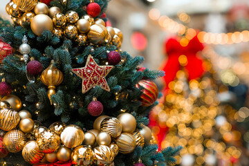 Beautiful Christmas background. Holiday toys on the Christmas tree. Concept of preparing...