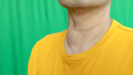 Thyroid gland inflammation at neck, goiter, throat cancer, sore throat and cough, man with neck...