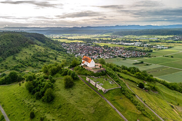 Aerial drone view of a lonely chapel (Wurmlinger Kapelle) on a hill near Tübingen in Southern...