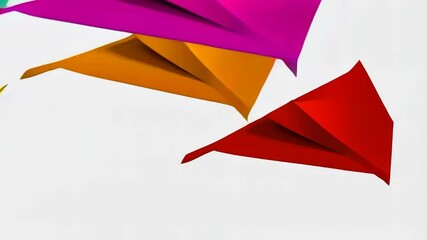 Colorful paper airplanes in flight