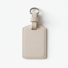 A minimalist off-white leather luggage tag with a silver keyring, shown against a bright white background.  The tag is rectangular with subtly rounded corners