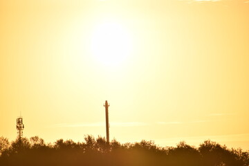 sunset or sunrise with clouds, sky and golden rays. © MARIA