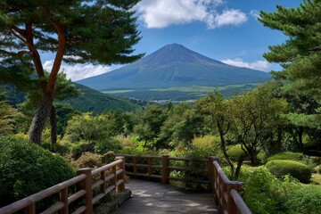 Scenic view of Mount Fuji behind trees and a wooden walkway