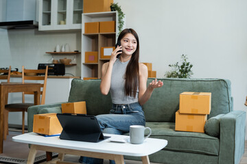 Woman start up online seller owner at workplace. small business entrepreneur SME or freelance asian...
