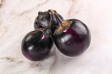 Raw violet and black eggplant
