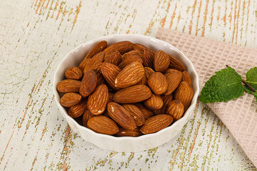 Tasty ripe almond nuts heap