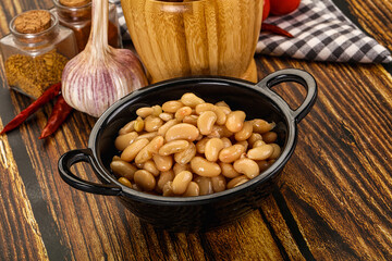 Baked white canned beans in the bowl