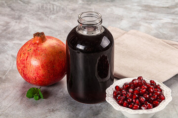 Sweet fresh pomegranate juice with fruit