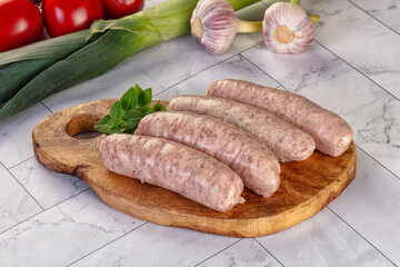 Raw pork sausages for grill
