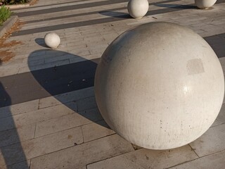Spheres representing Solar system. Monument to medieval researcher.