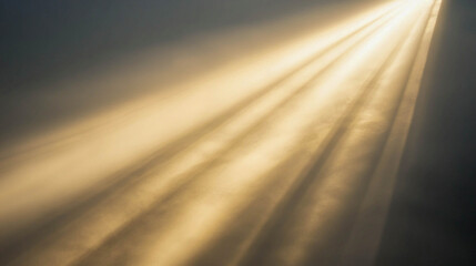 Sunlight that penetrates through a crack or window and creates a bright beam of light on the surface.