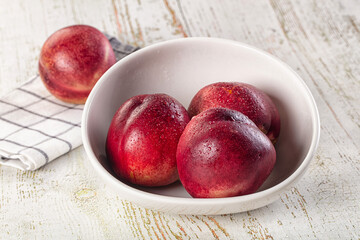 Ripe sweet juicy nectarines heap