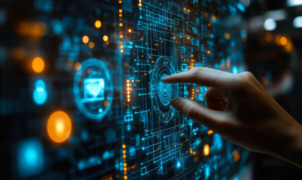 Close-up of human hand interacting with futuristic digital touchscreen interface displaying blue and orange data and technology graphics in virtual environment