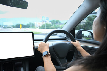Interior view of electric vehicle with blank dashboard display screen ideal for app interface design