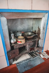 Cooking food on a traditional stove in the house of the Pamir population of the Pamirs in the village of Karakul