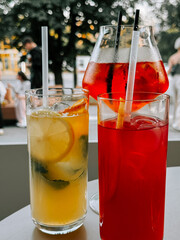 Colorful cocktails on a sunny afternoon in a lively outdoor cafe setting